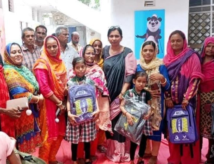 Helping Hands Trust and Cares Global Distributed School Opening Kits to Pak Refugees Families Children's at Meshana, Gujarat.